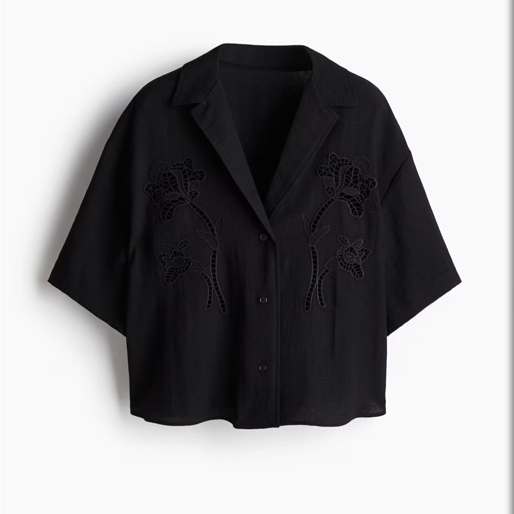 Black shirt with eyelet embroidery
